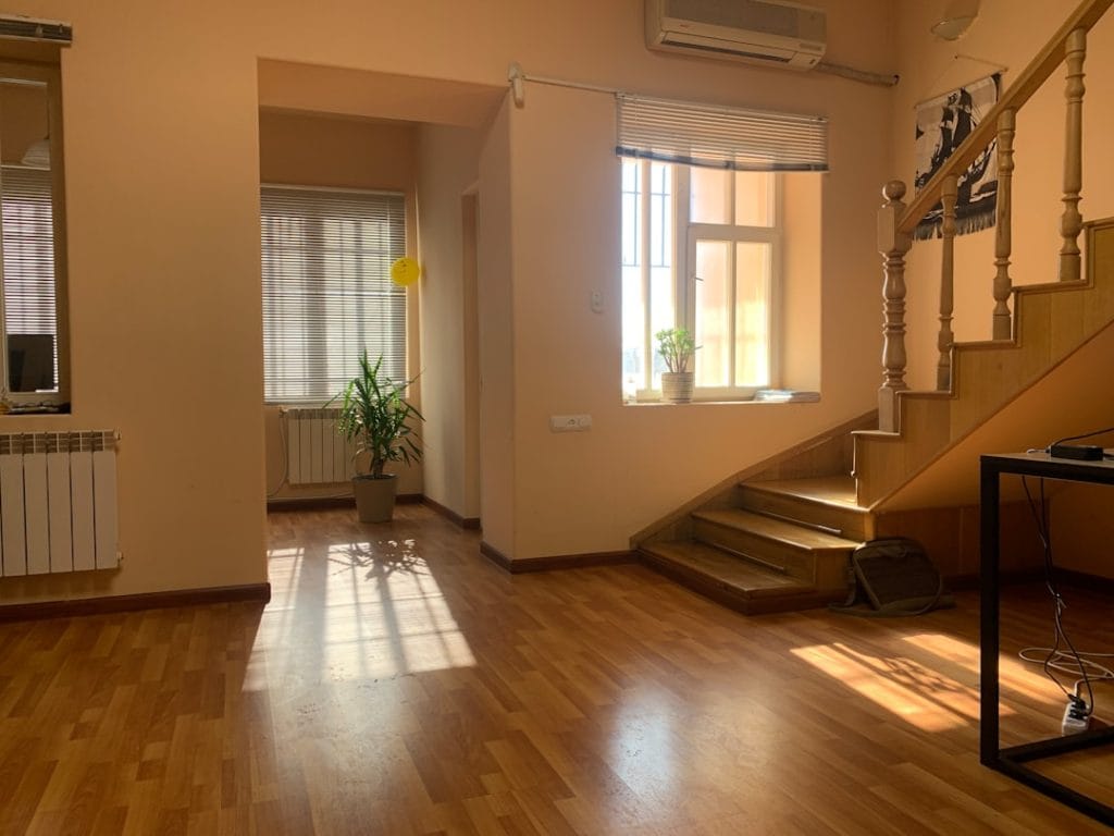 brown-wooden-parquet-floor-near-white-wooden-door-5jckmzvsrny